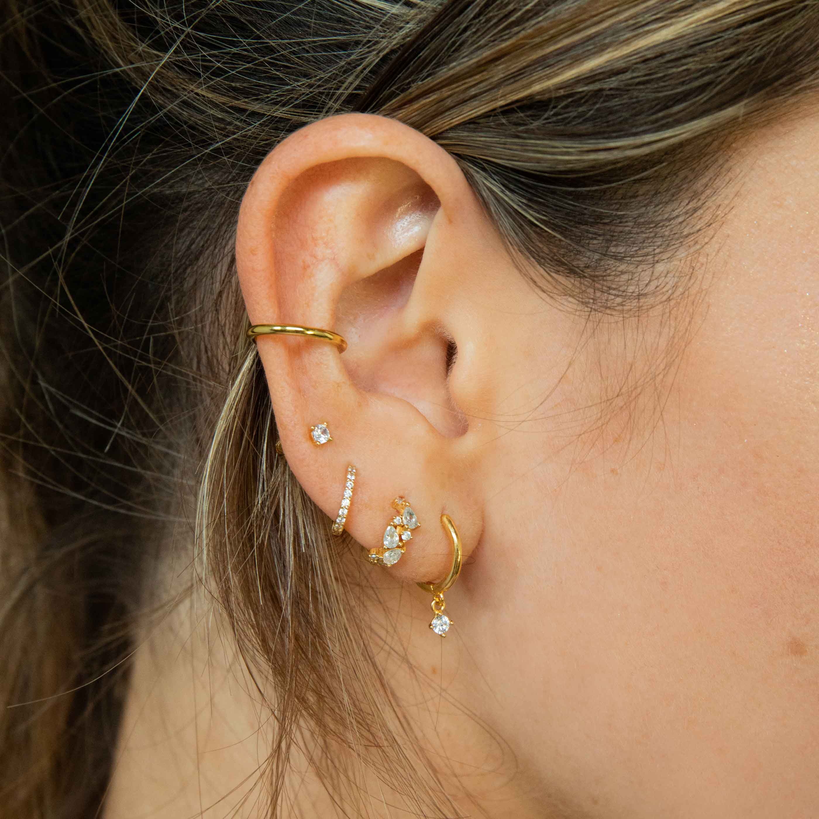 April Birthstone Huggies in Gold with White CZ - Image 4